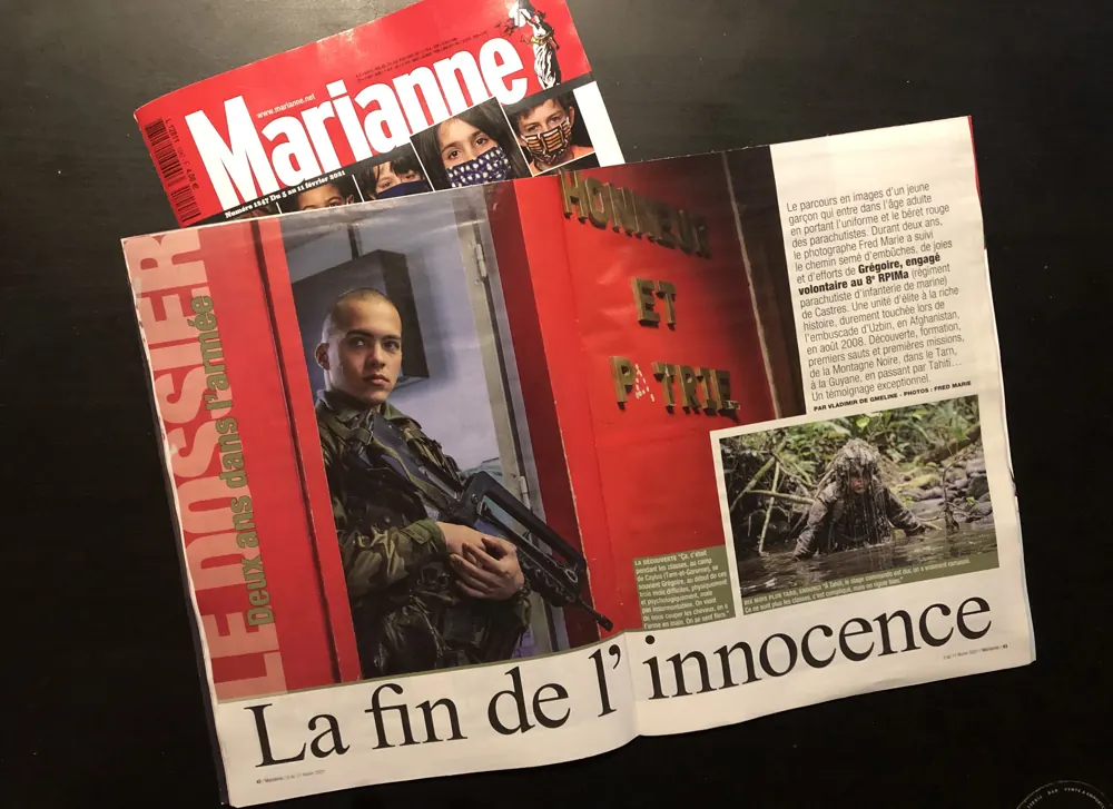 Press tearsheet — a report by Fred Marie published in the press