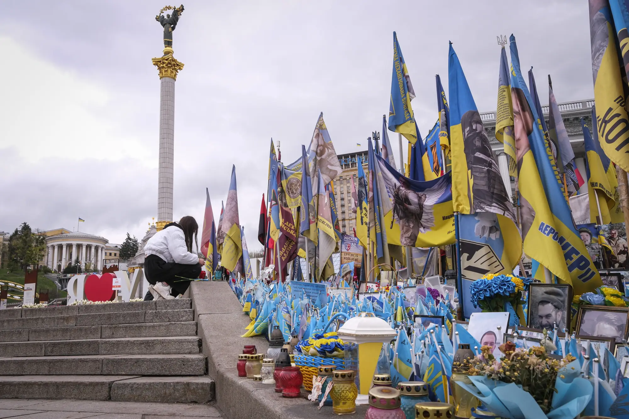 Thousands of small Ukrainian flags and candles honouring fallen soldiers on the Maidan in Kyiv